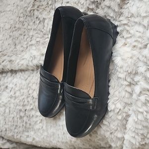 Unstructured by Clarks Black Leather Penny Loafers